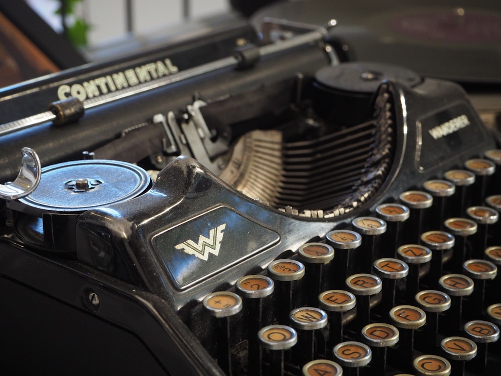 a close up of an old fashioned typewriter