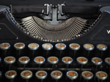 a close up of an old fashioned typewriter