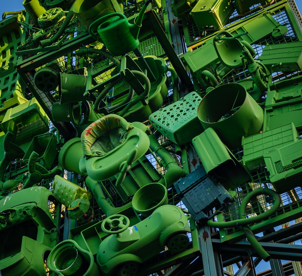 a bunch of green objects that are stacked together