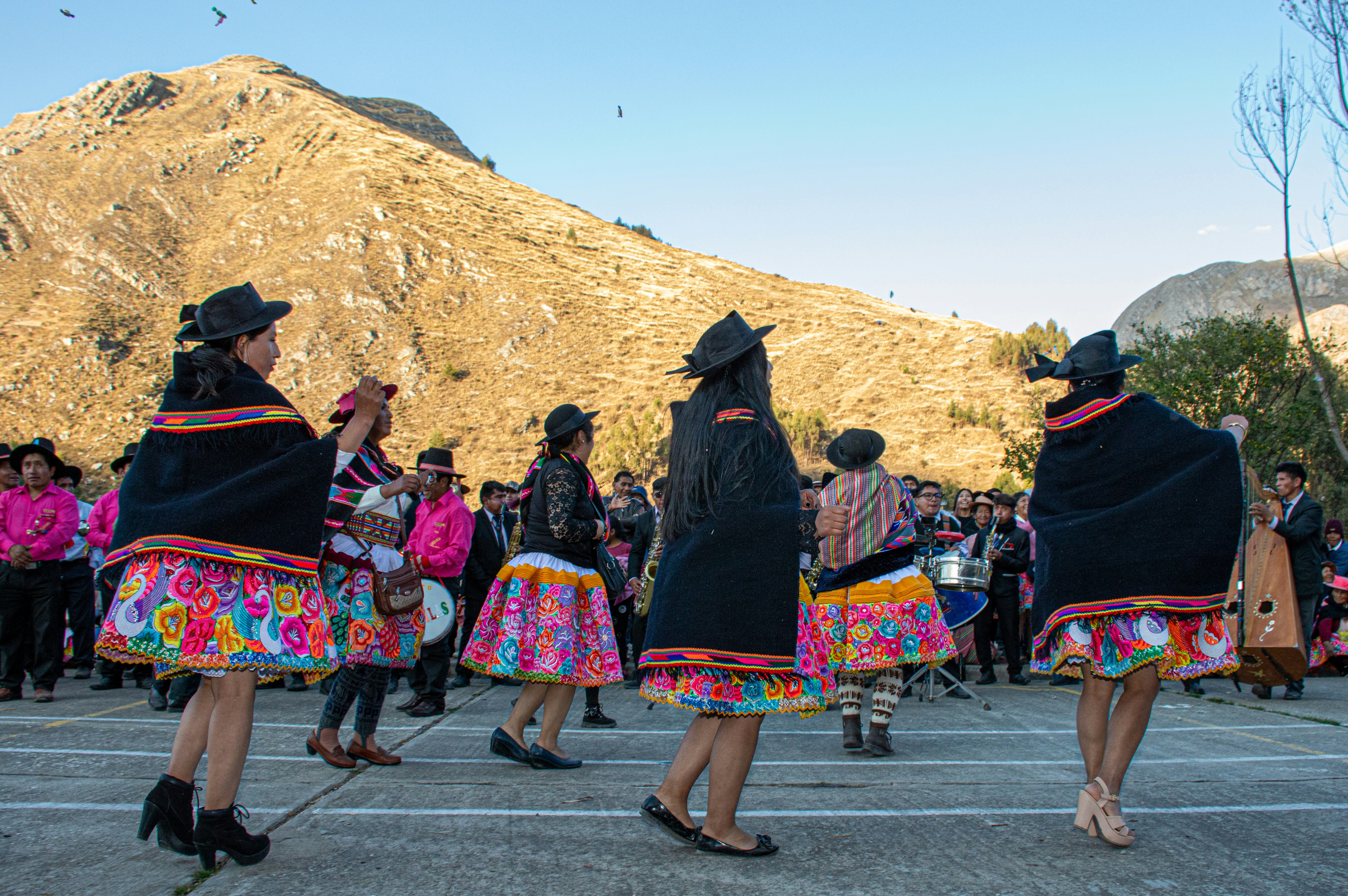 a group of people dressed in mexican costumes