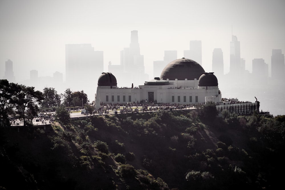 a view of a large building on top of a hill