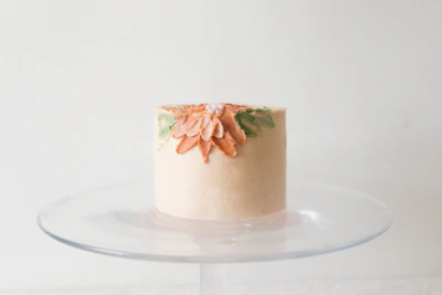 A selection of handmade cake toppers featuring delicate floral designs.