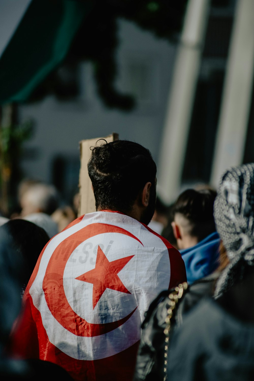 a man with a flag on his back