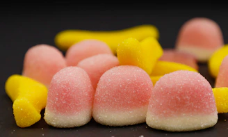 Colorful, nutritious gummy treats for pets displayed on a light background.
