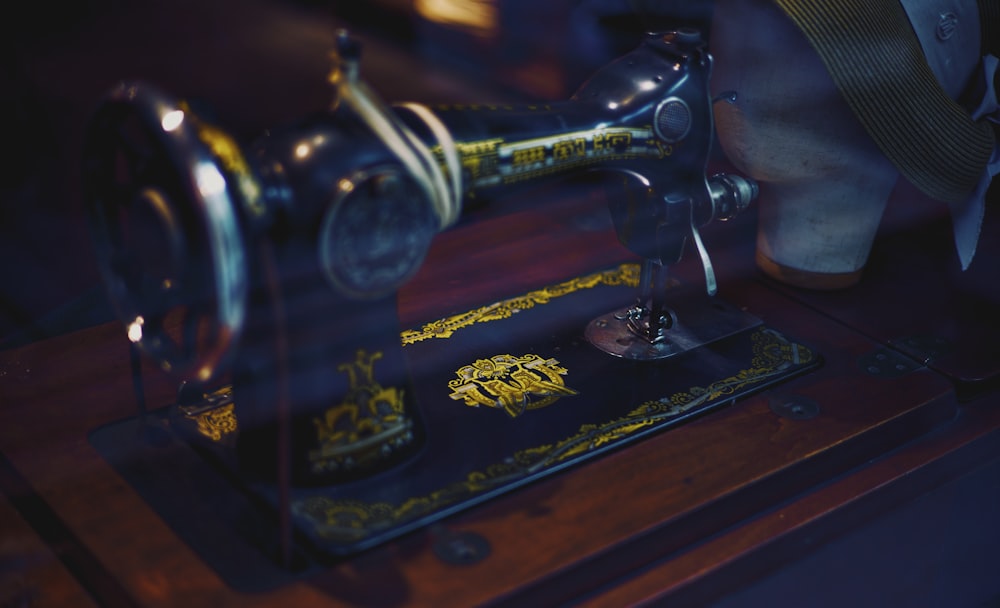 a close up of a sewing machine on a table