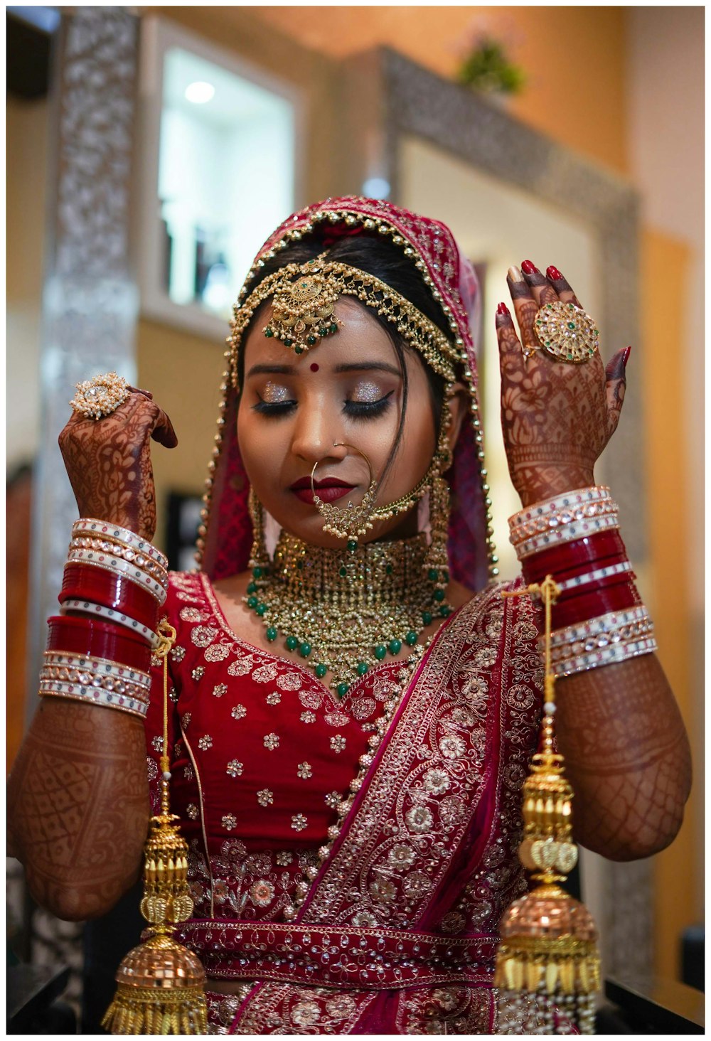 a woman dressed in a red and gold outfit