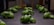 Several small green plants are growing on a flat, dark surface, likely part of a hydroponic or indoor garden setup. The plants are arranged in neat rows and are well-lit, highlighting their healthy green leaves.