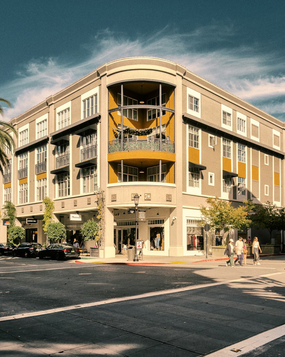 a building with a balcony and balconies on top of it