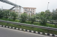 Urbanization work showing freshly paved streets and new sidewalks.