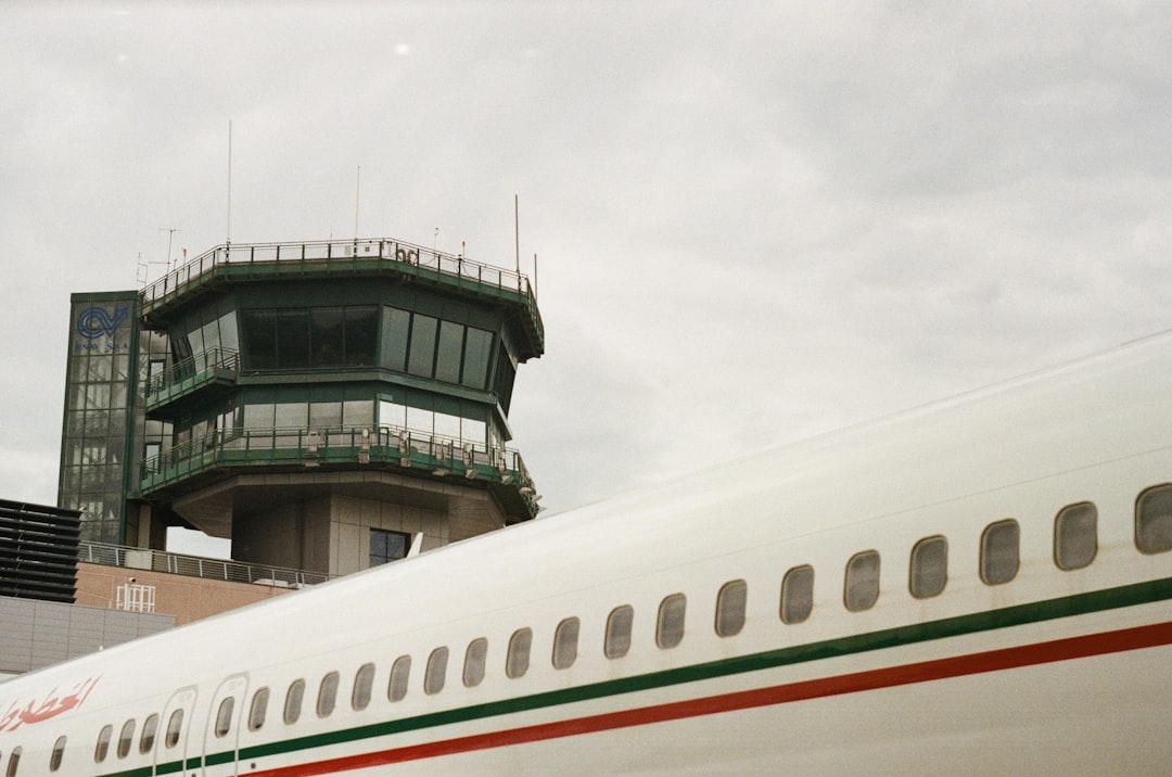 a large jetliner sitting on top of an airport tarmac,