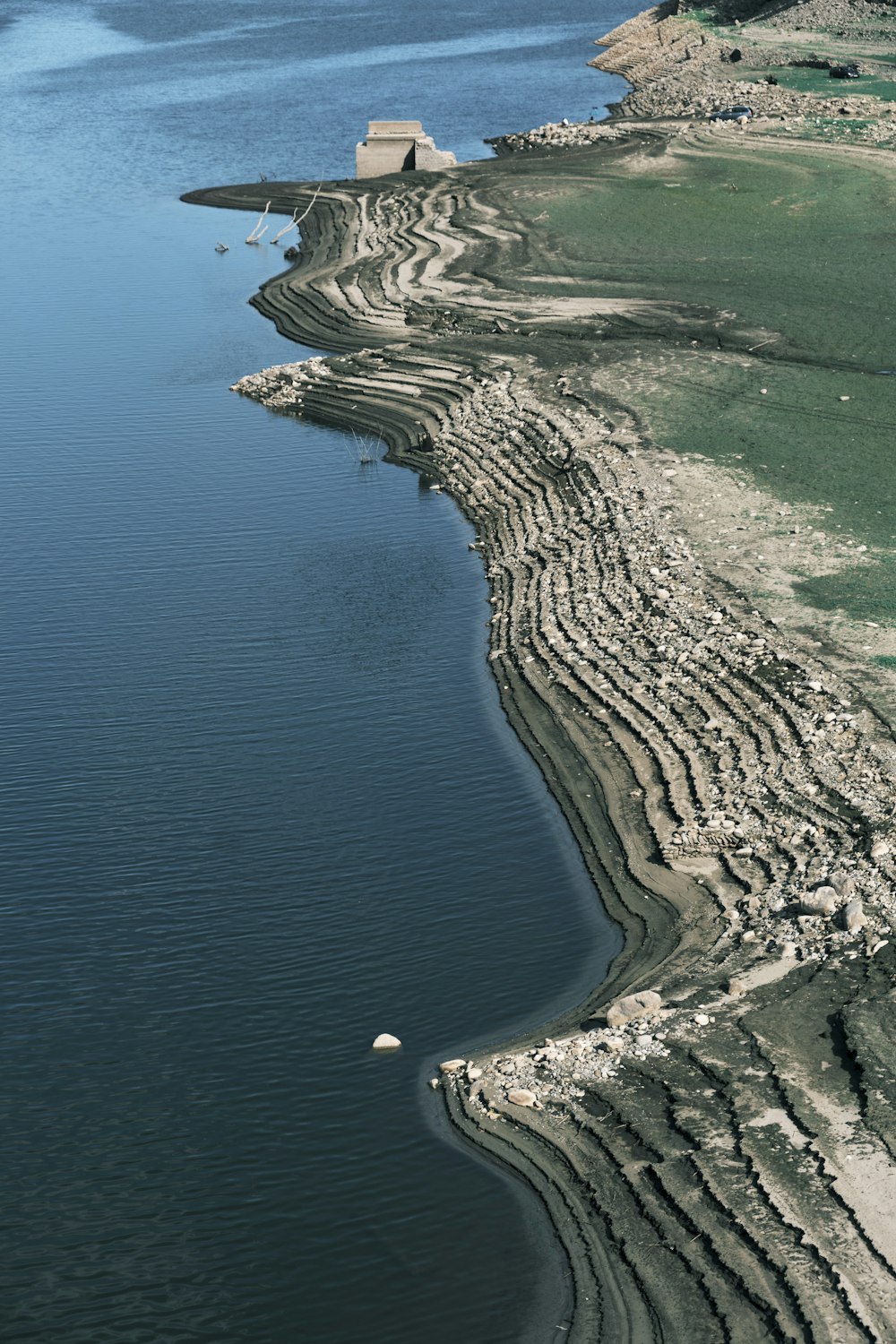 a large body of water next to a beach