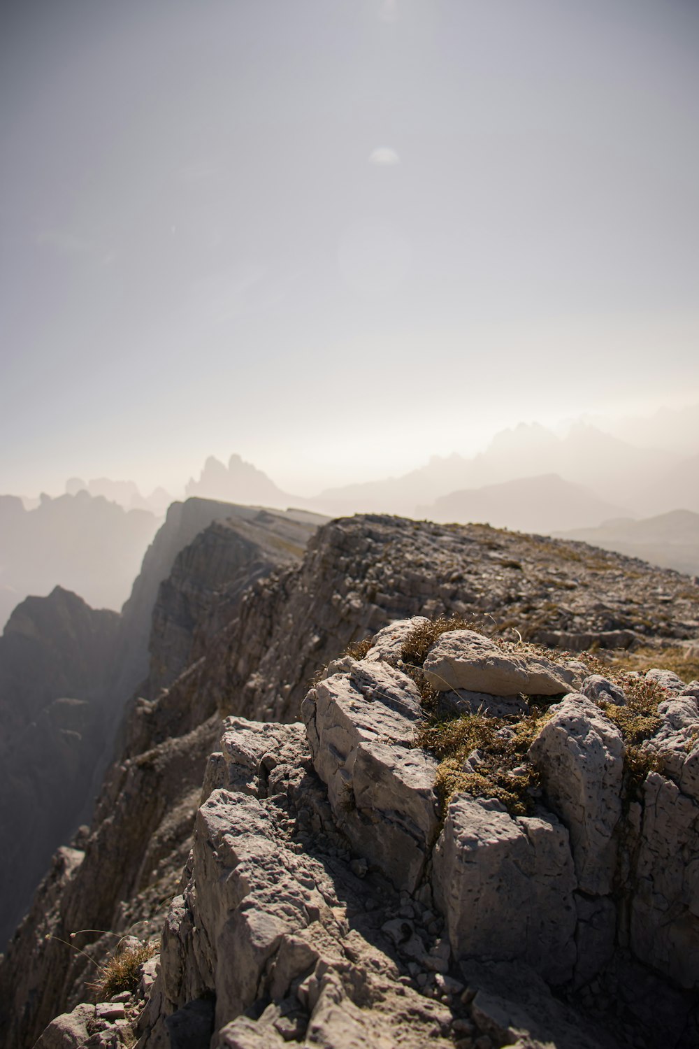 a person standing on top of a rocky mountain