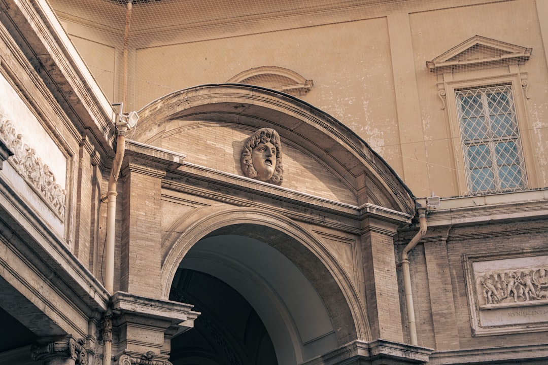 a large building with a clock on the front of it,