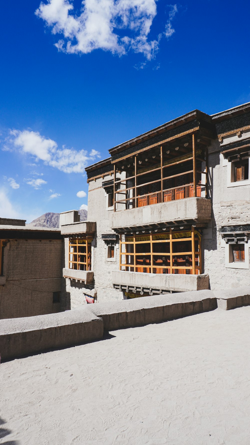 a building that is made of concrete and wood