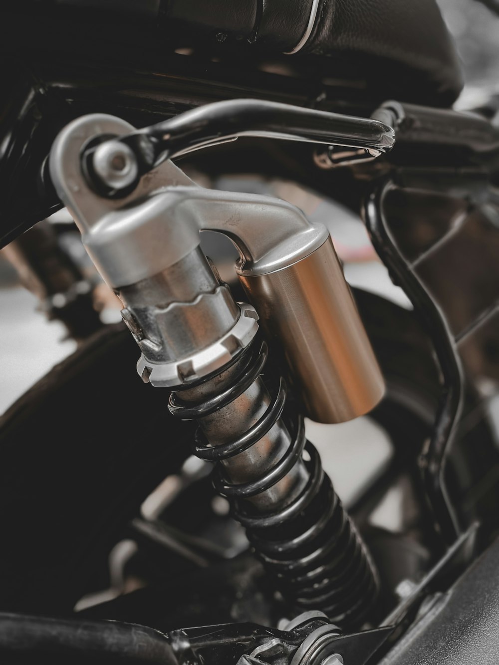 a close up of a motorcycle's front suspension