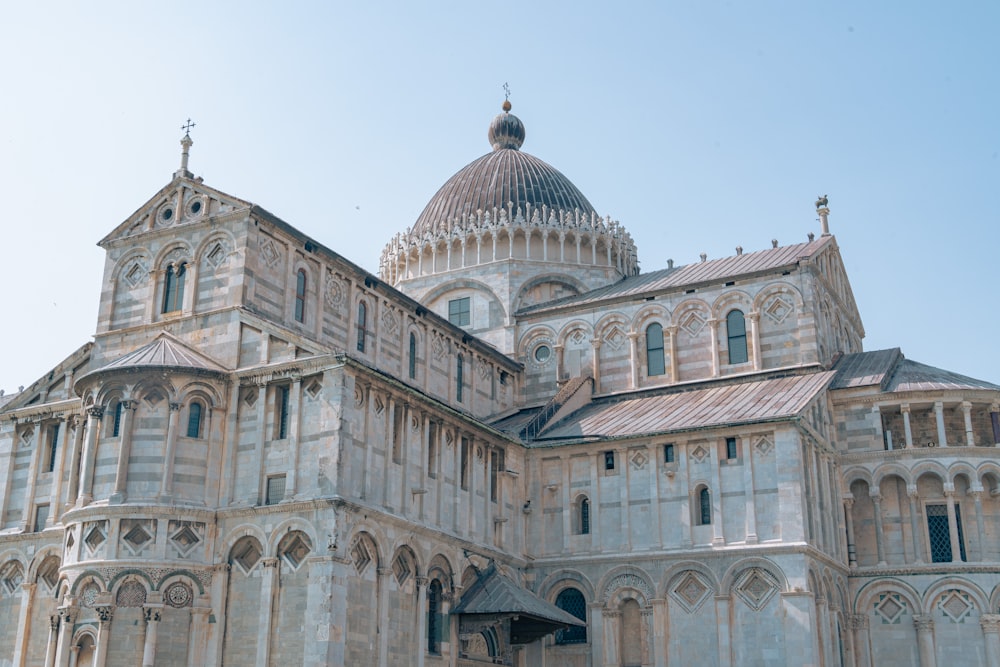 a large cathedral with a clock on the front of it