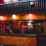 A colorful Vietnamese lantern hanging inside the restaurant, casting a warm glow.