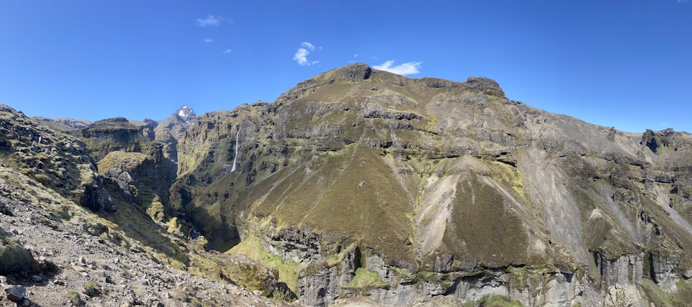 a view of a mountain from the top of a hill