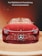 A sleek, futuristic red car is prominently displayed with a shiny and modern design. The car features a distinctive logo on the front grille and is set against a stylish background with warm, orange lighting. The words 'Neue Möglichkeiten der Personalisierung' and 'New level of personalization' are visible above the car, emphasizing a theme of innovation and customization.