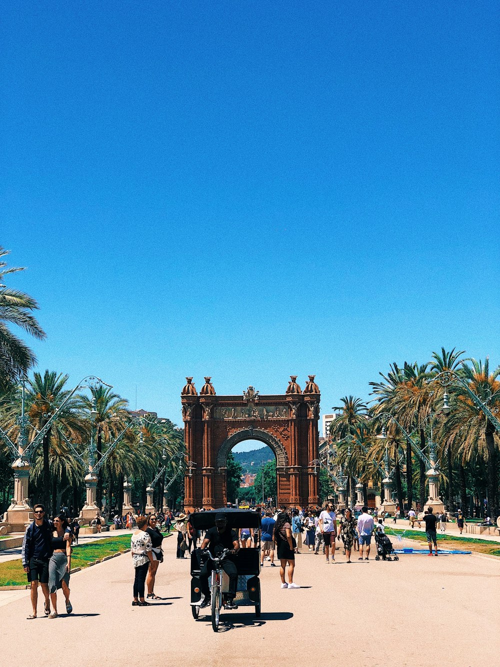 a group of people standing in front of a gate