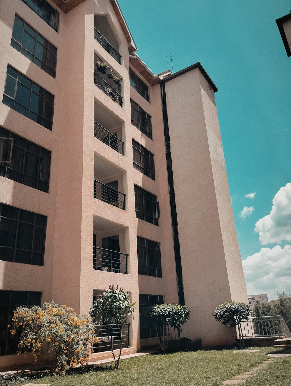 a tall building with balconies and balconies on top of it