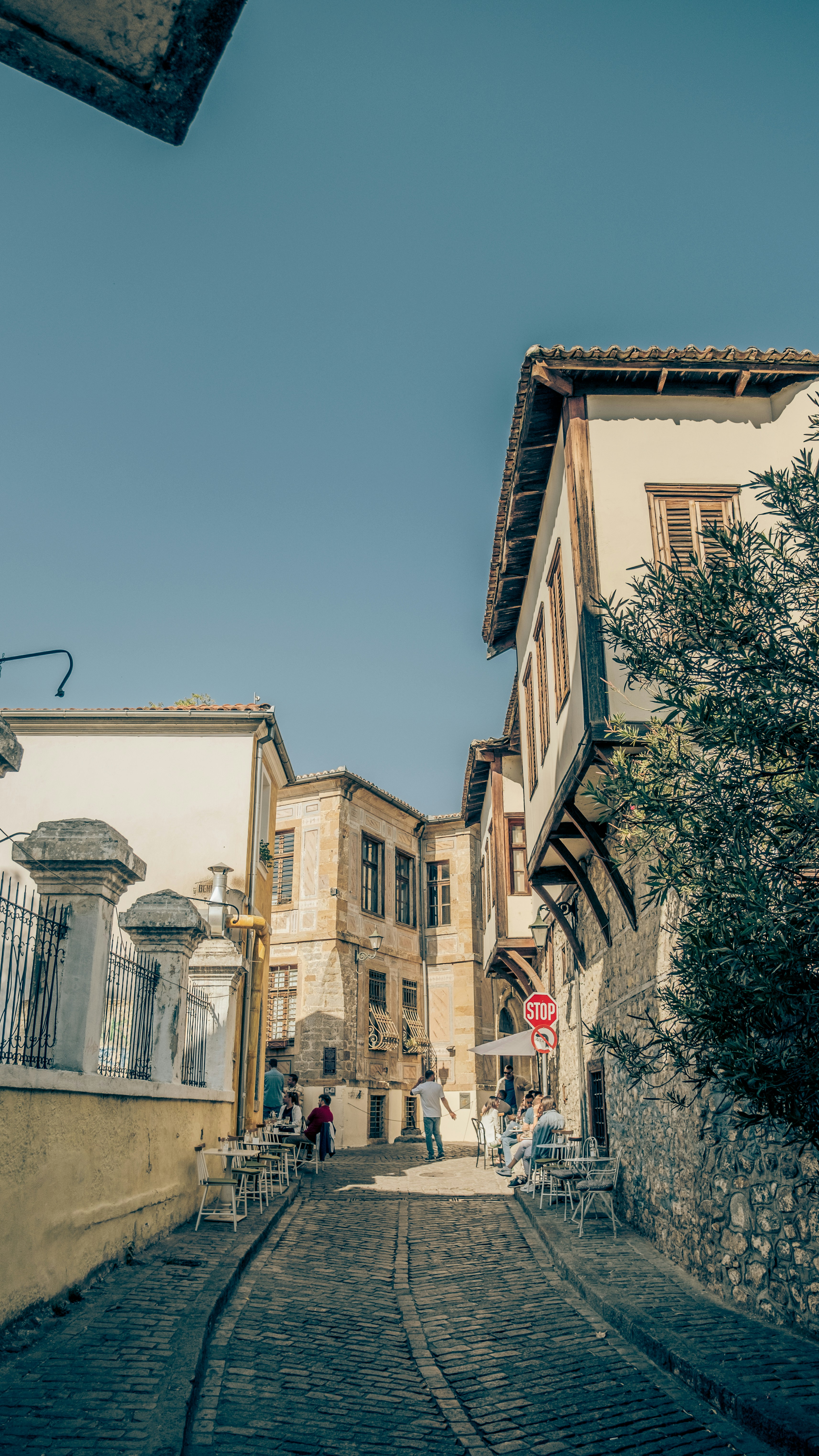 a cobblestone street in a small town