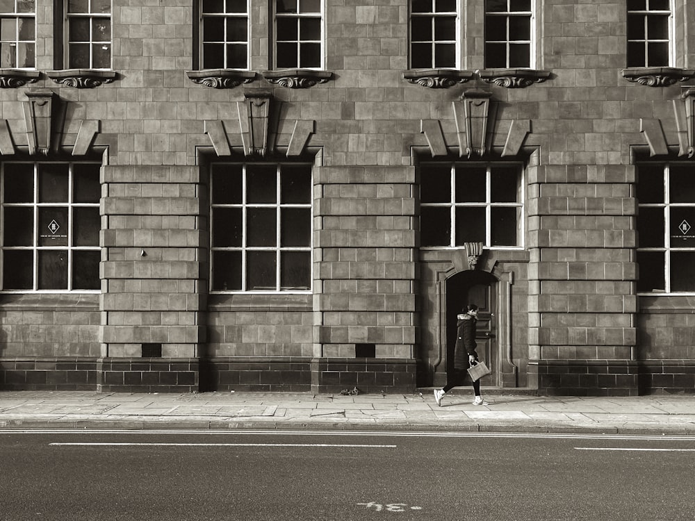 a black and white photo of a tall building