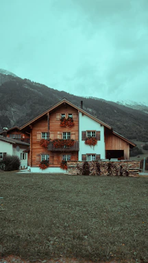 Cozy modern wooden house under rainy sky in southern Chile surroundings.