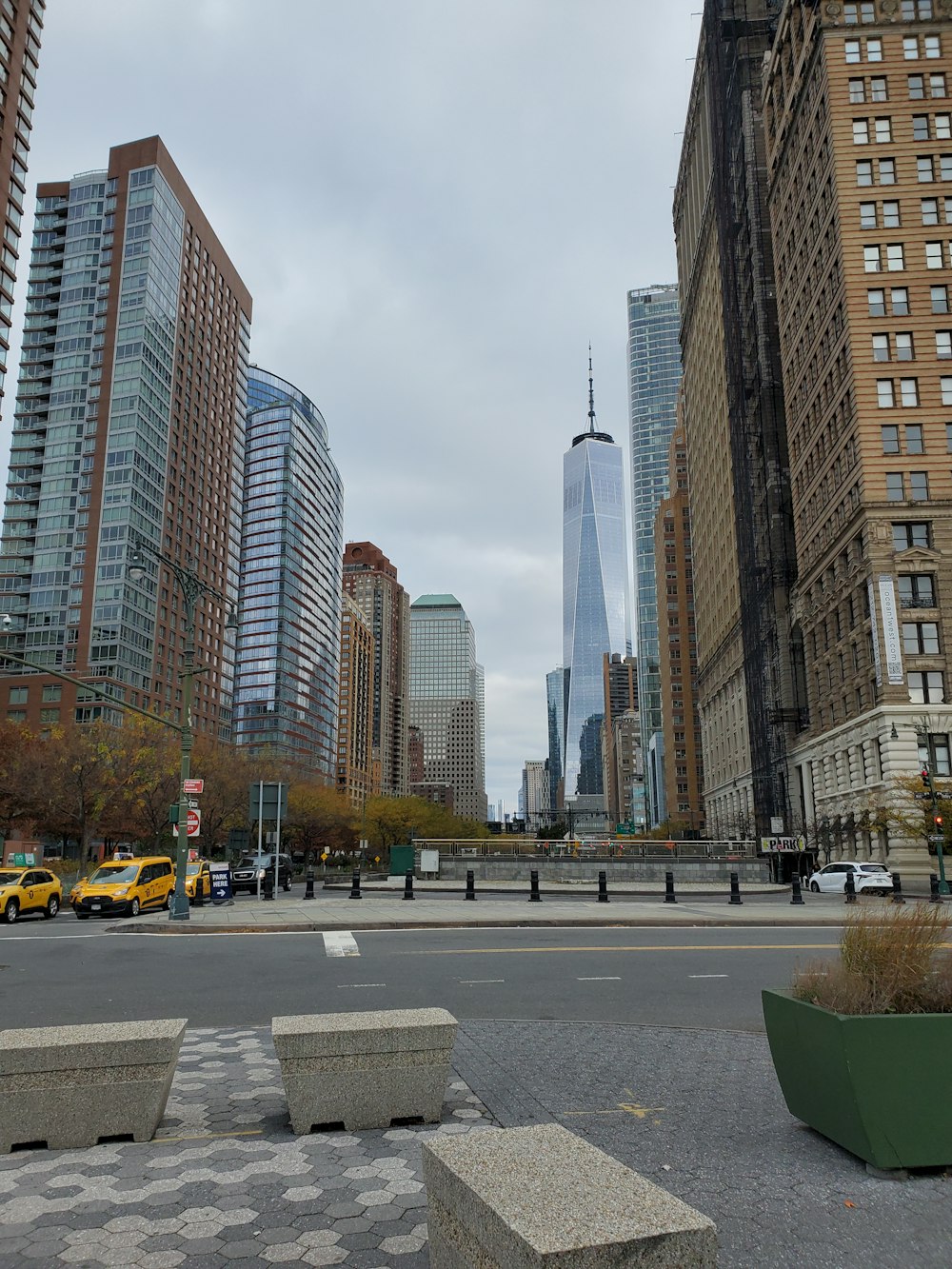 a view of a city with tall buildings in the background