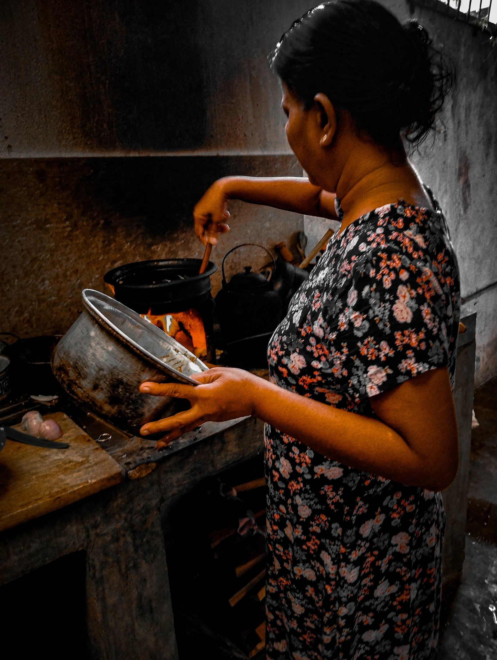 Village women preparing hot hoppers and coconut rotis
