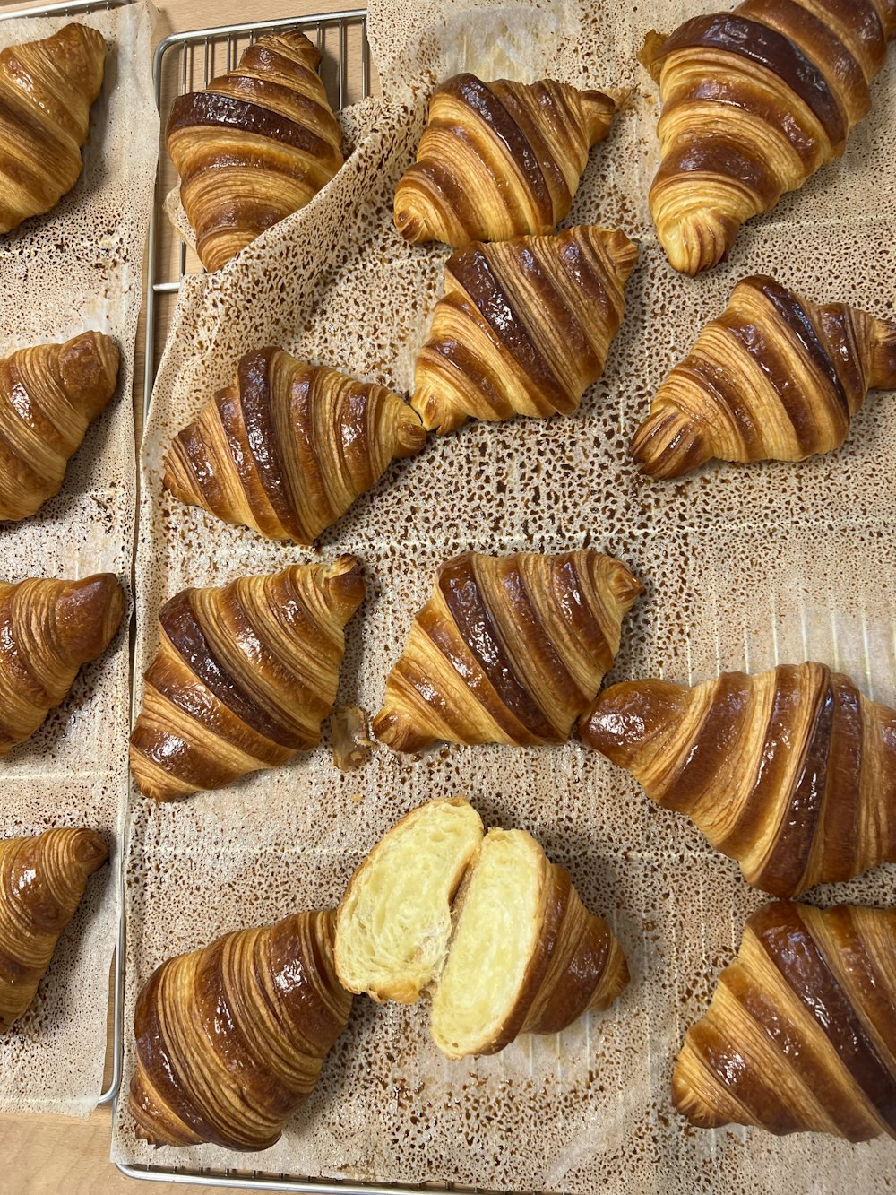 a bunch of croissants that are on a table