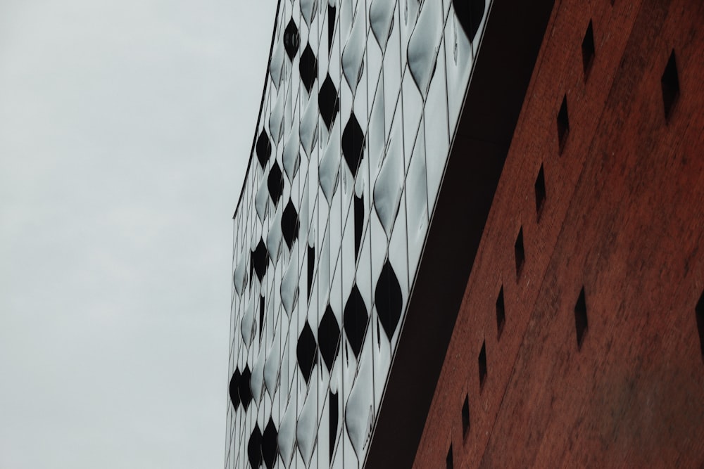 a close up of a building with a sky background