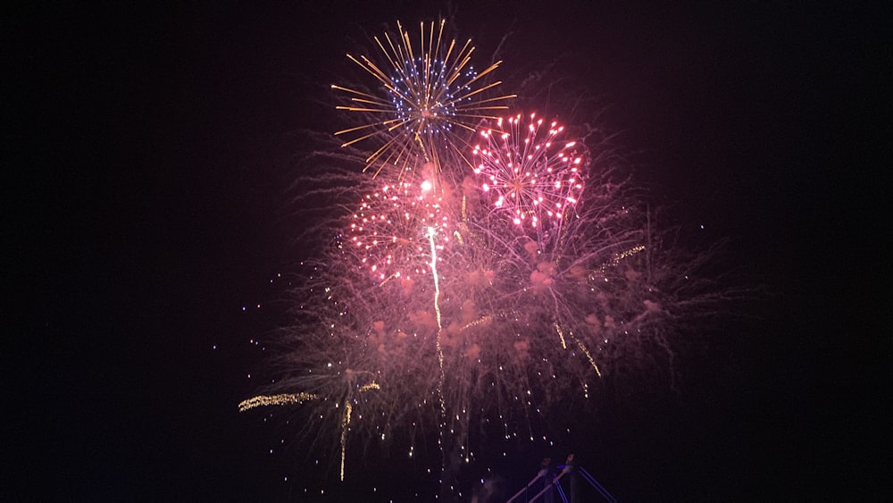 a large fireworks display in the night sky