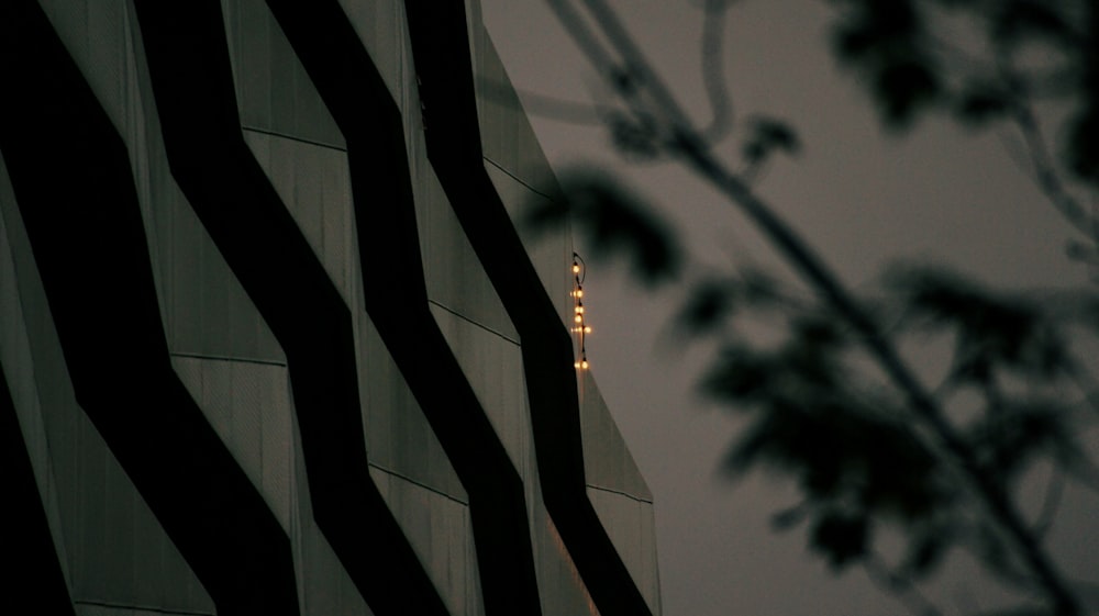 a tall building with a clock on it's side