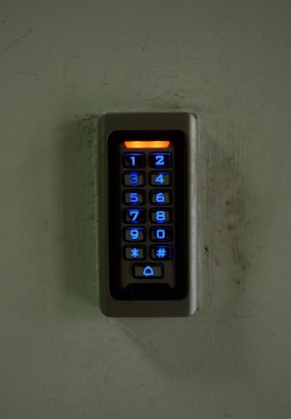a key board mounted to a wall in a room