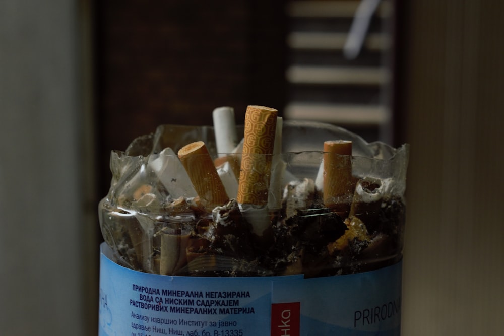 a cigarette holder filled with lots of cigarettes