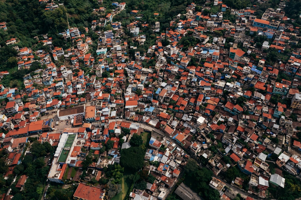 an aerial view of a city with lots of houses