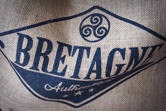a close up of a bag with a logo Bretagne on it