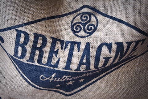 a close up of a bag with a logo Bretagne on it