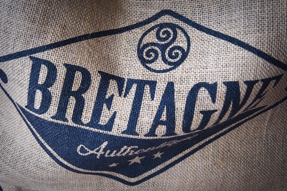a close up of a bag with a logo on it