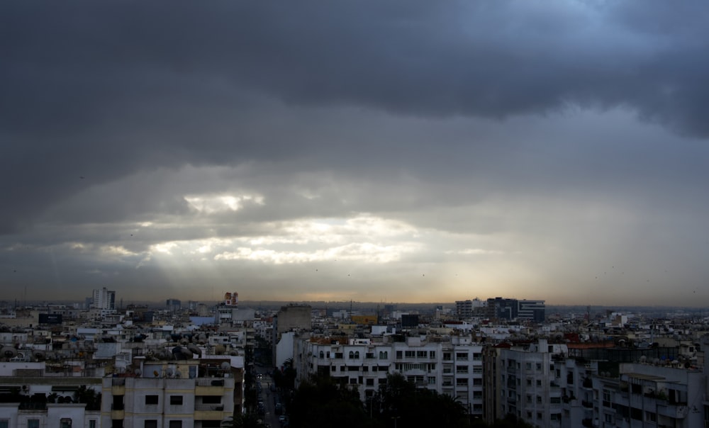 a view of a city under a cloudy sky