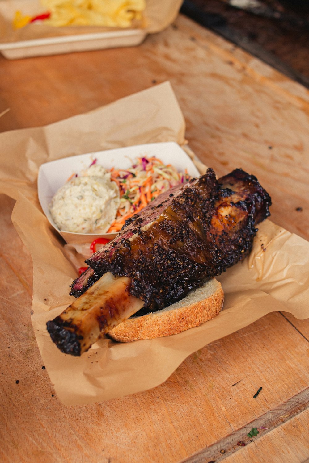 a plate of food on a wooden table