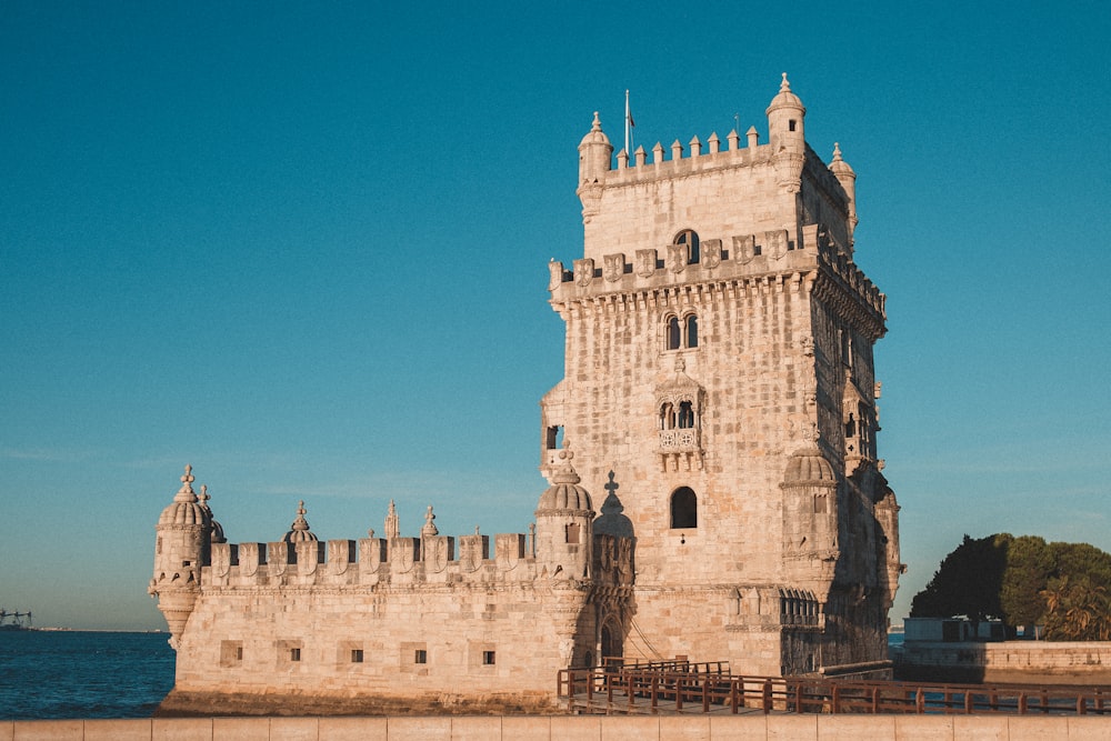 a tall tower with a clock on the top of it