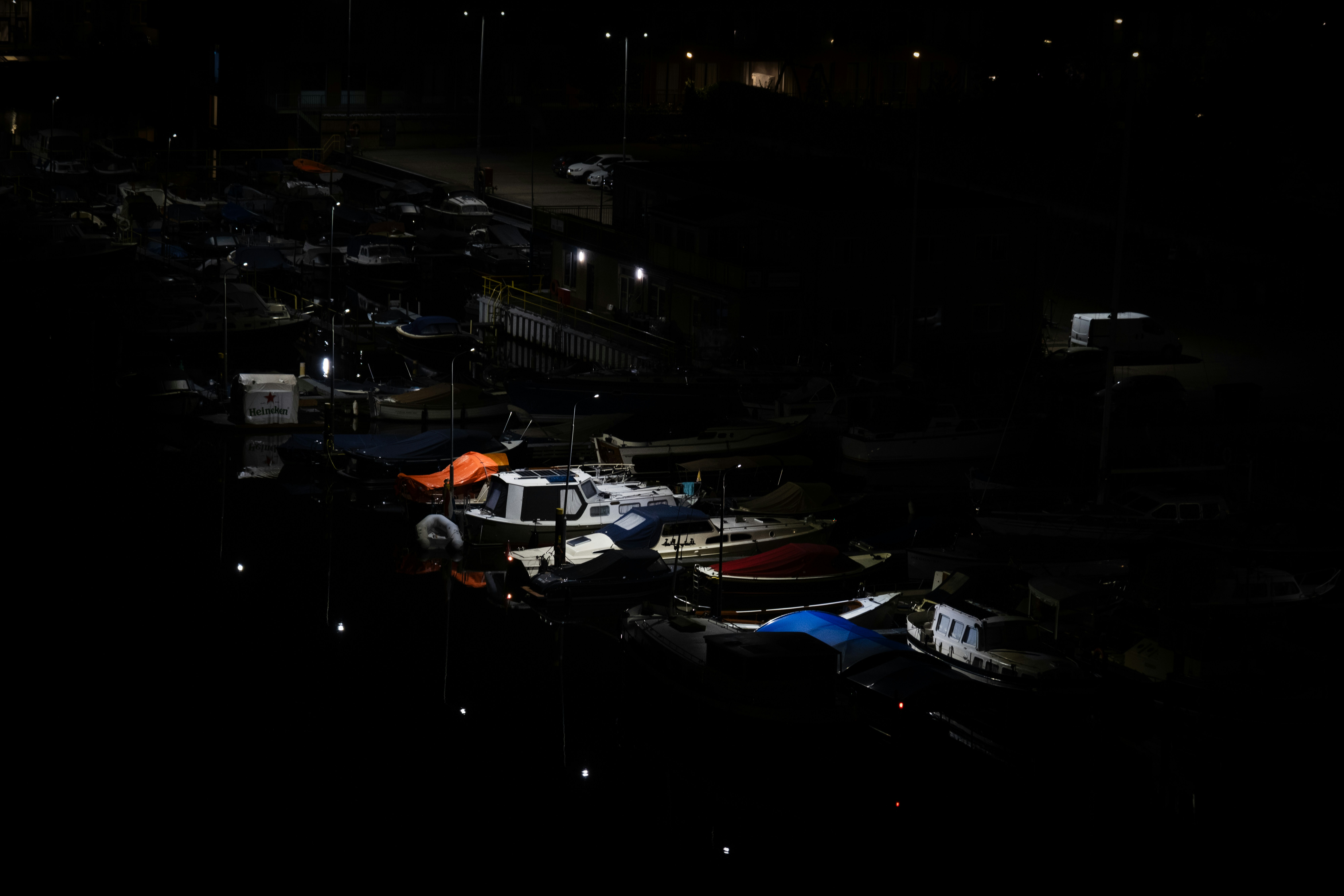 a group of boats that are sitting in the water