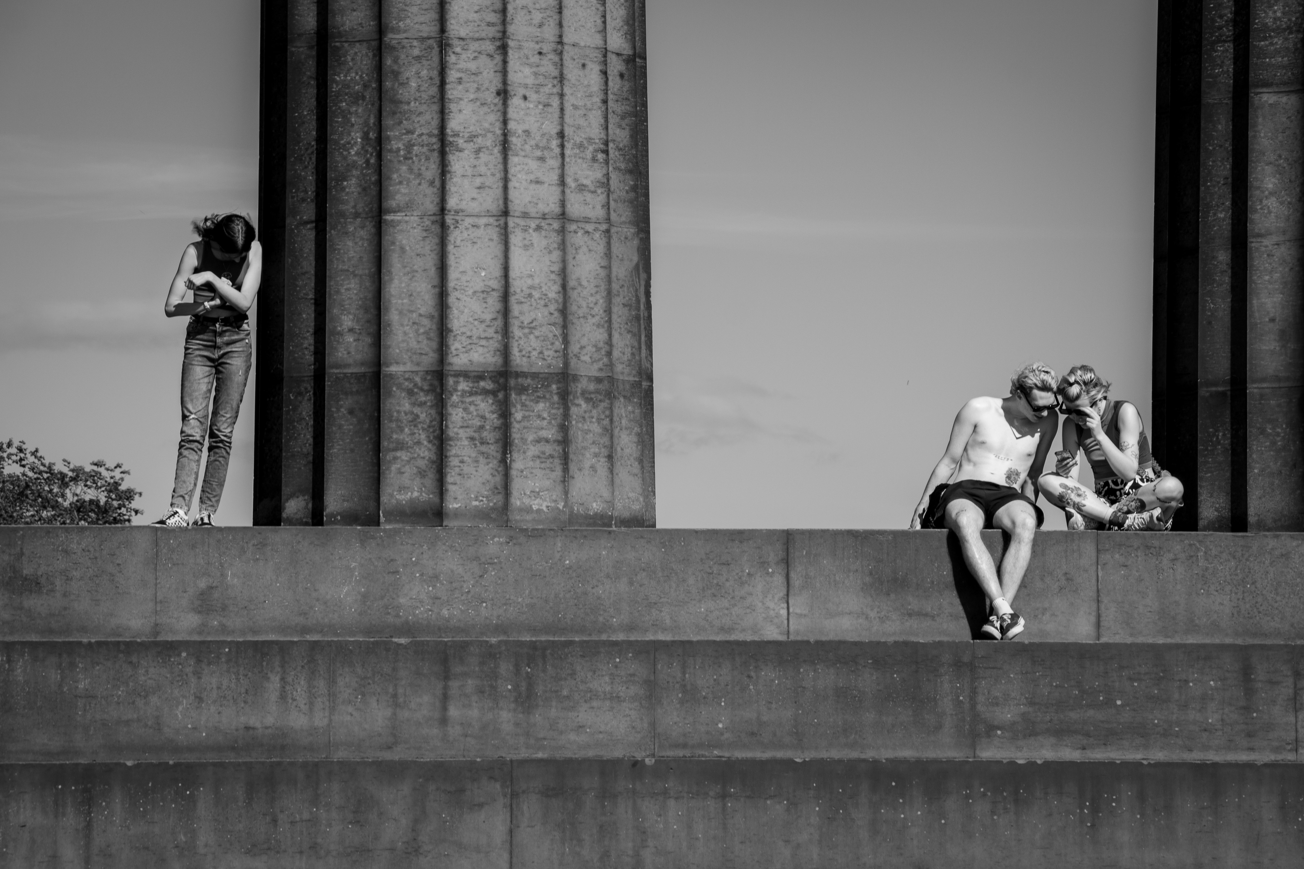 a couple of people that are sitting on some steps