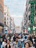 A bustling city street filled with diverse people.