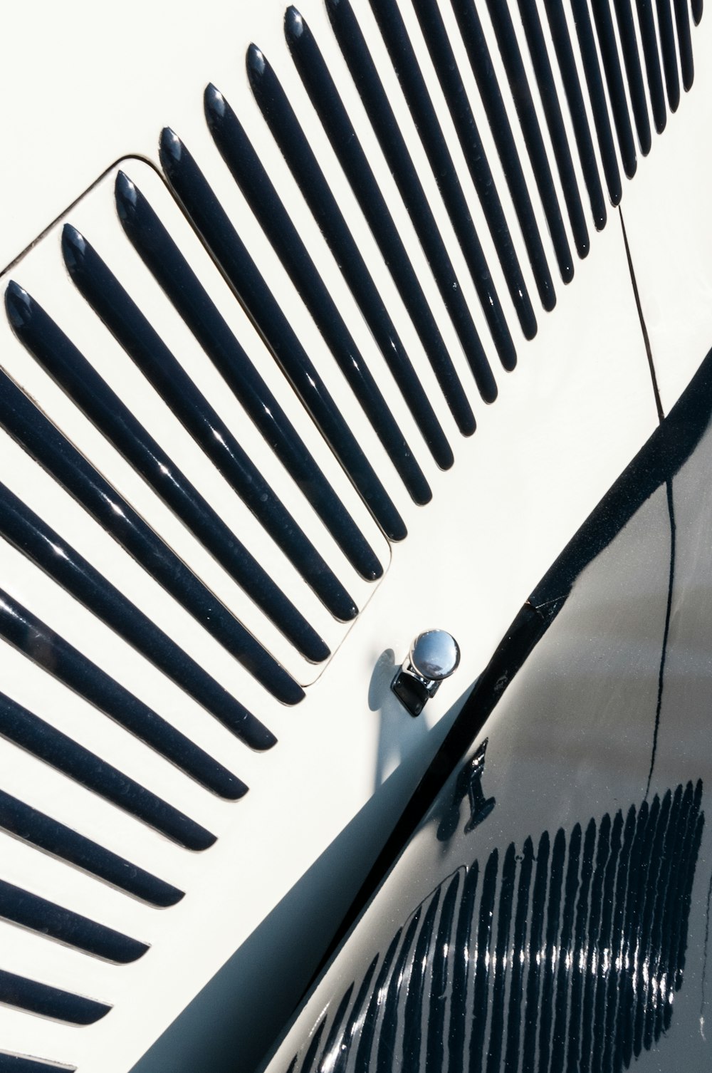 a close up of a black and white car