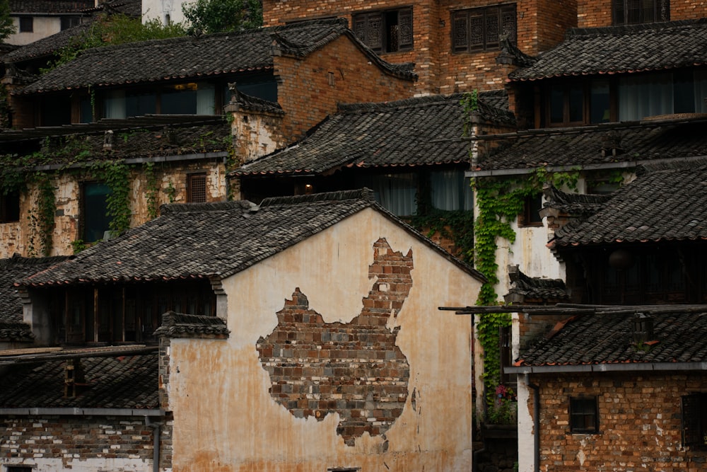 an old building with a map on the side of it