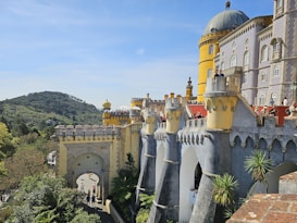 a castle like building with a yellow roof
