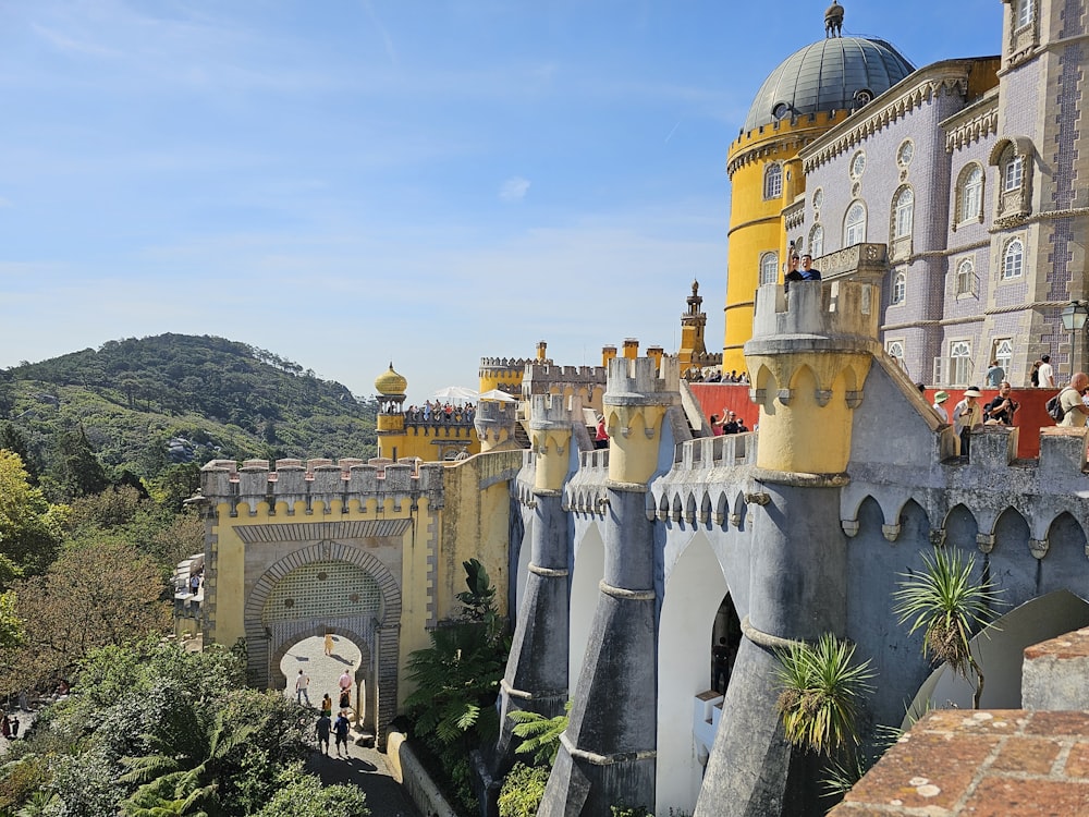a castle like building with a yellow roof